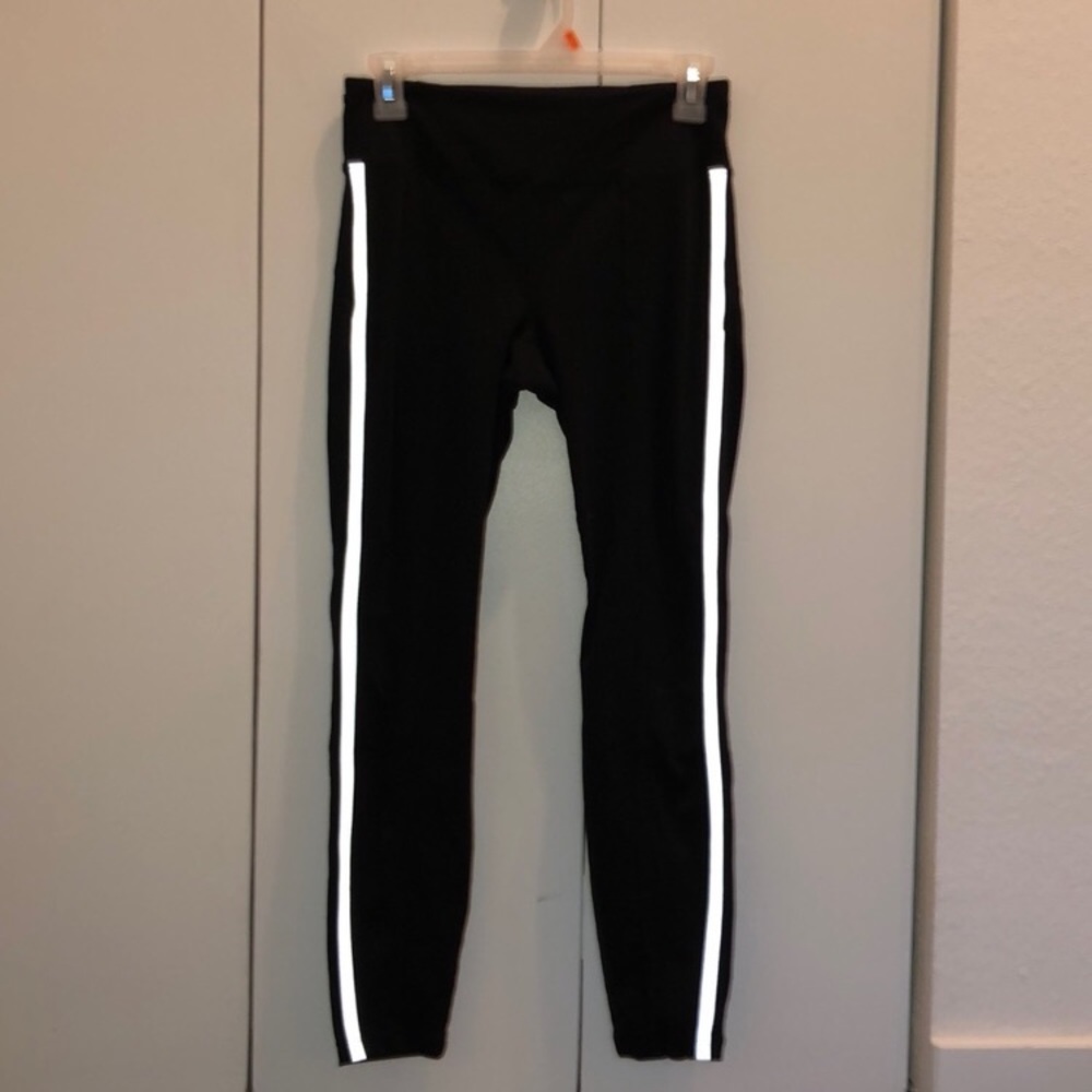 Athleta medium black leggings with white stripe
